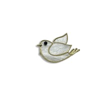 Bird brooch